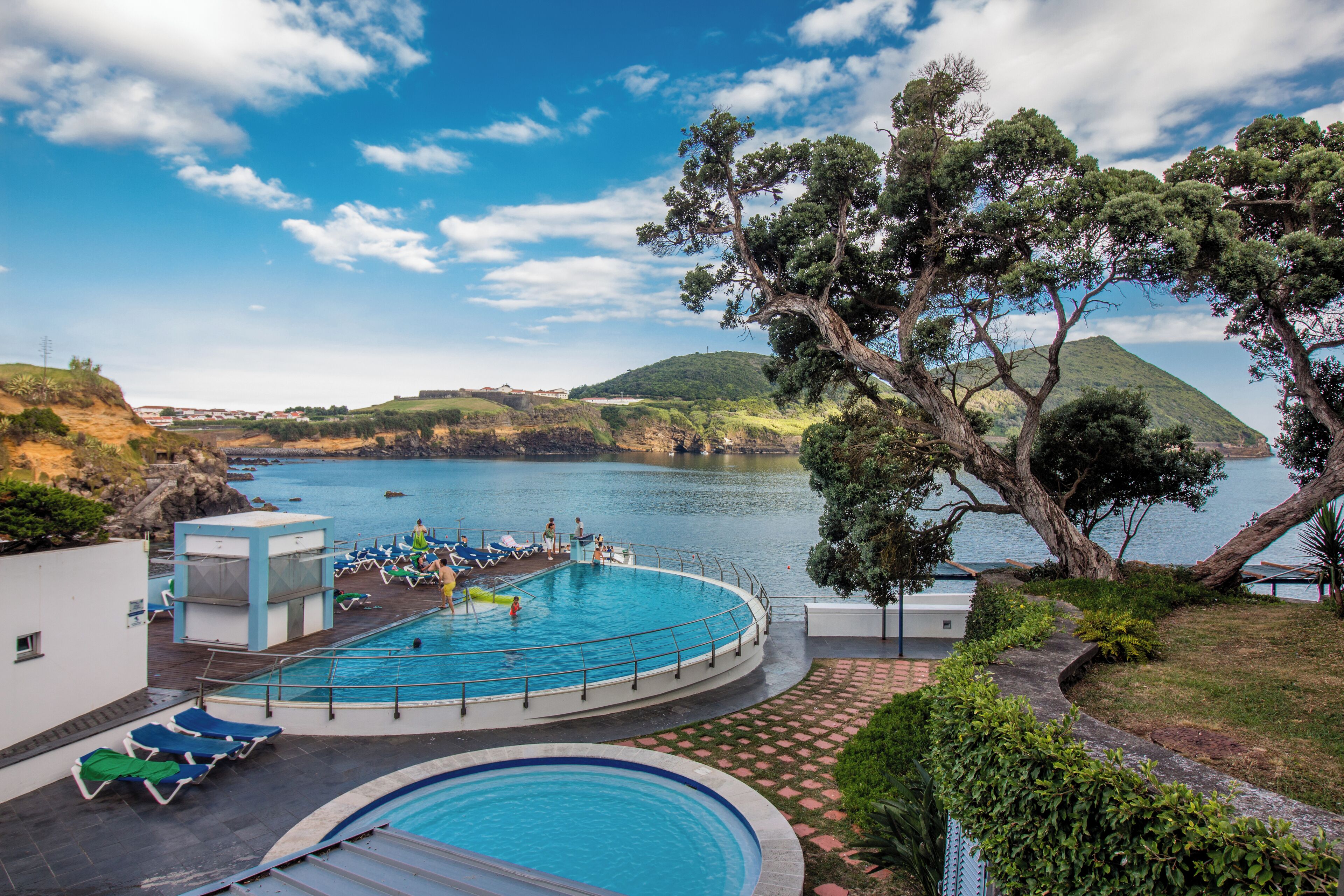 indoor pool, outdoor pool, pool loungers