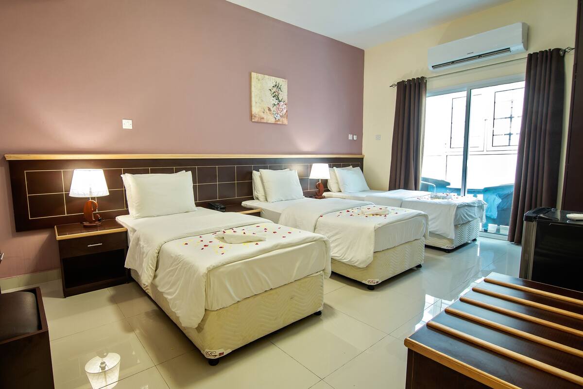Standard Triple Room, 3 Bedrooms | Pillowtop beds, minibar, iron/ironing board, WiFi (free)