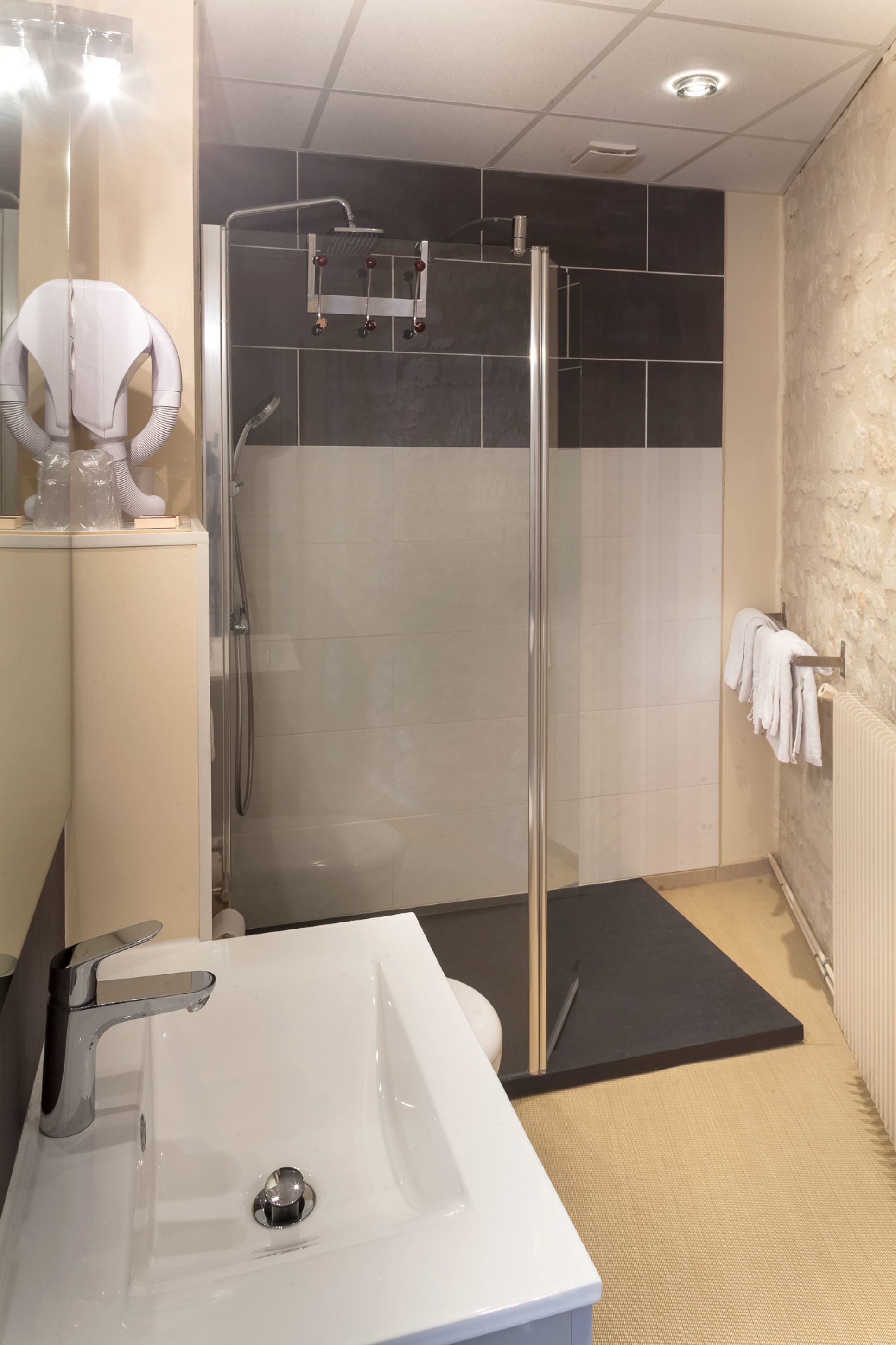 combined shower/bathtub, free toiletries, hair dryer, towels