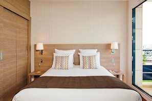 In-room safe, desk, blackout curtains, soundproofing