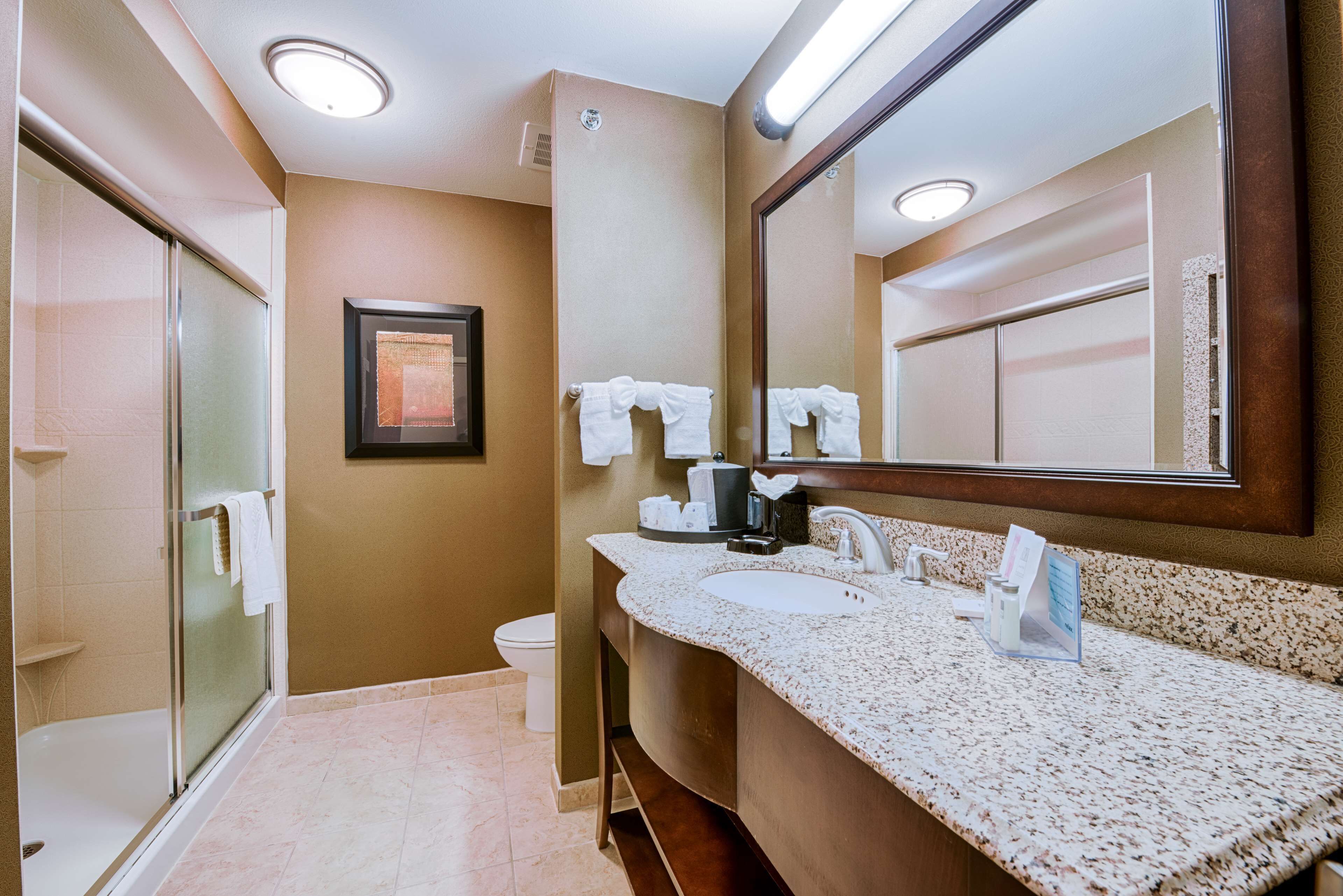 king suite, studio | bathroom | bathtub, hair dryer, towels