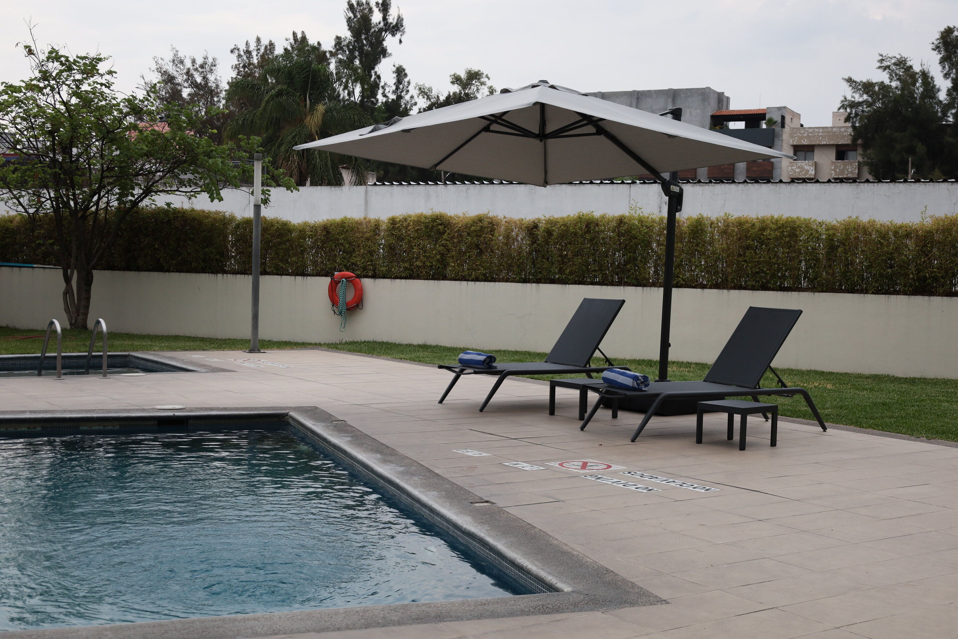 Outdoor pool, open 8 AM to 9 PM, sun loungers