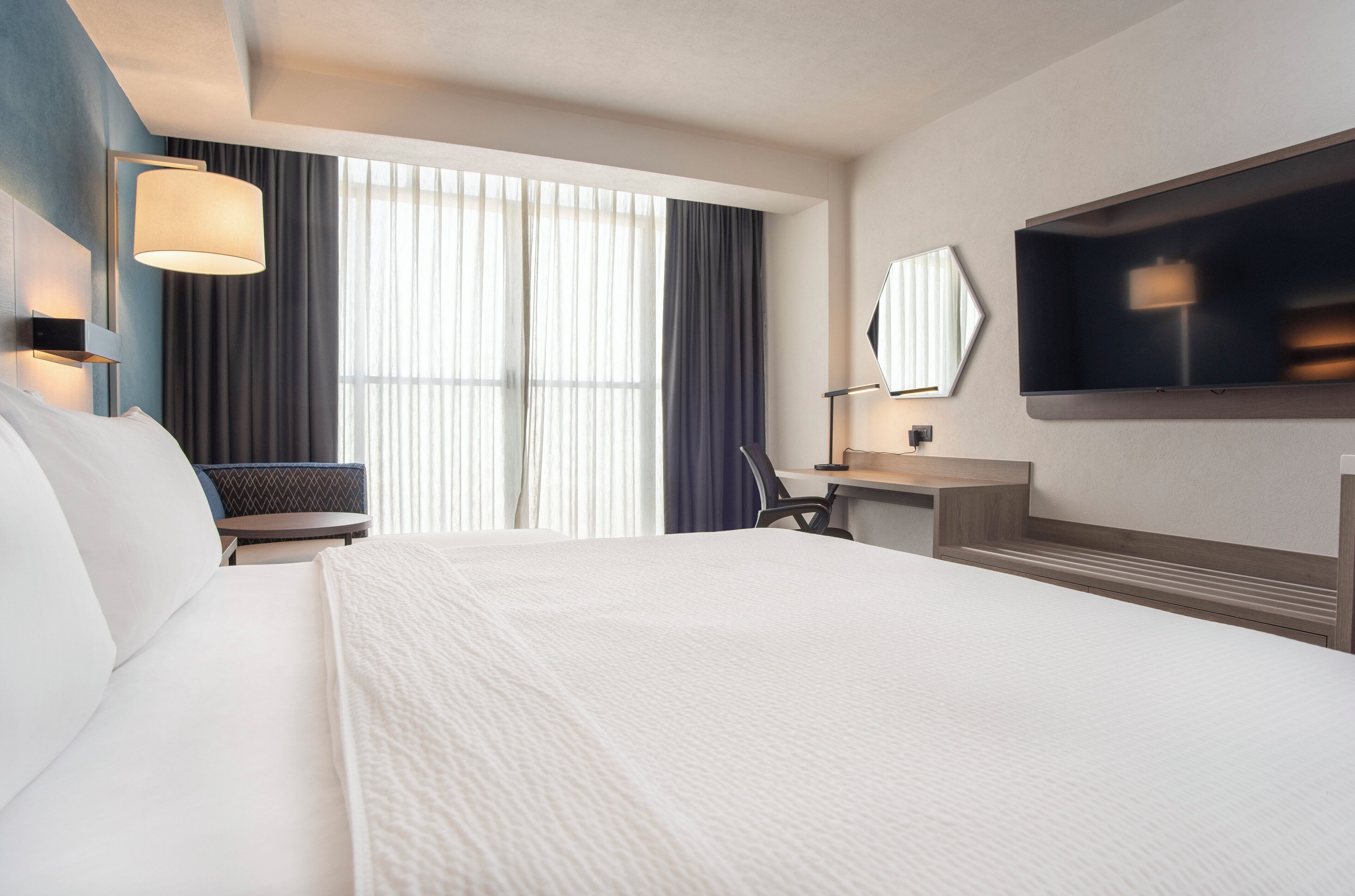 in-room safe, desk, blackout curtains, iron/ironing board