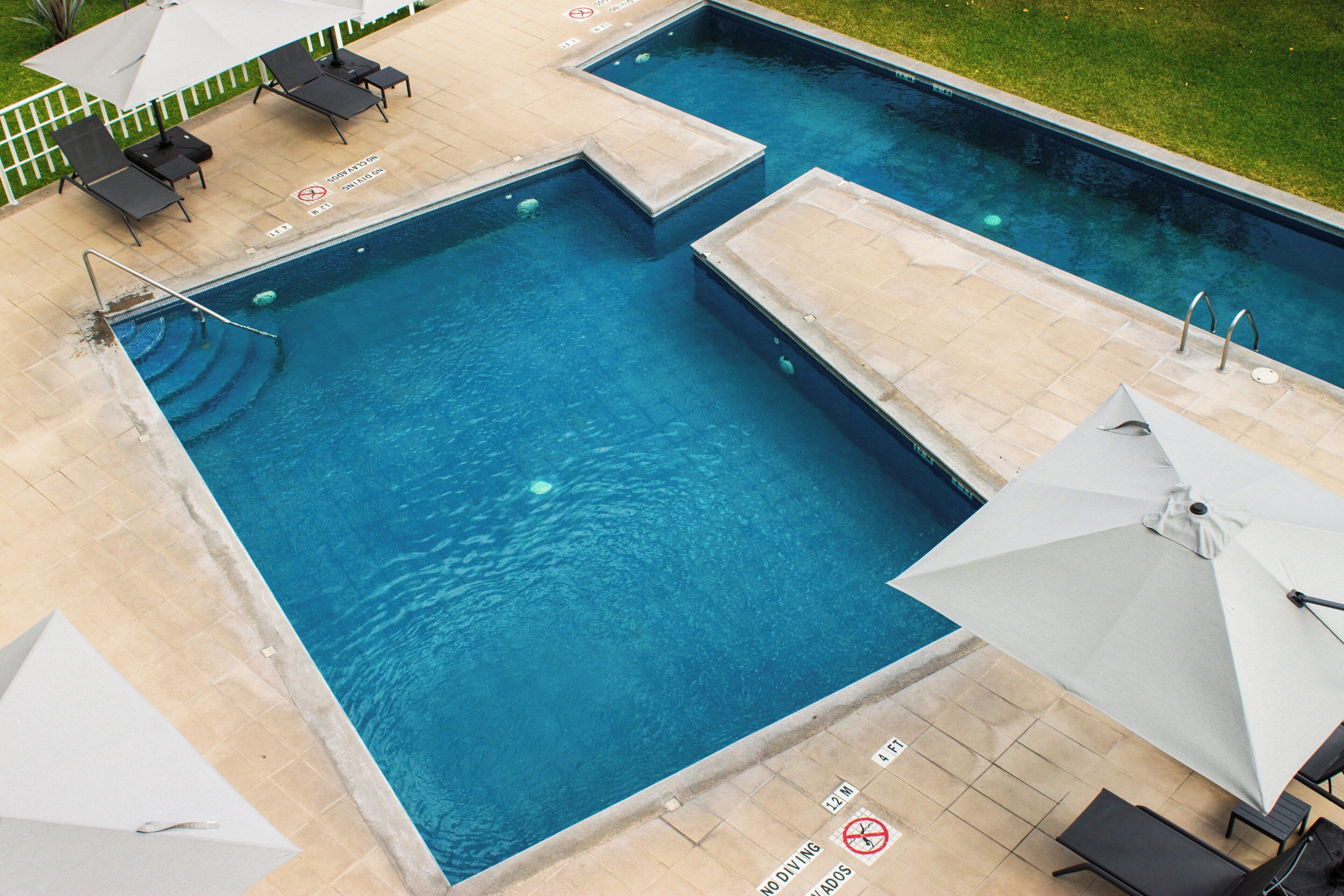 outdoor pool, open 8 am to 9 pm, pool loungers