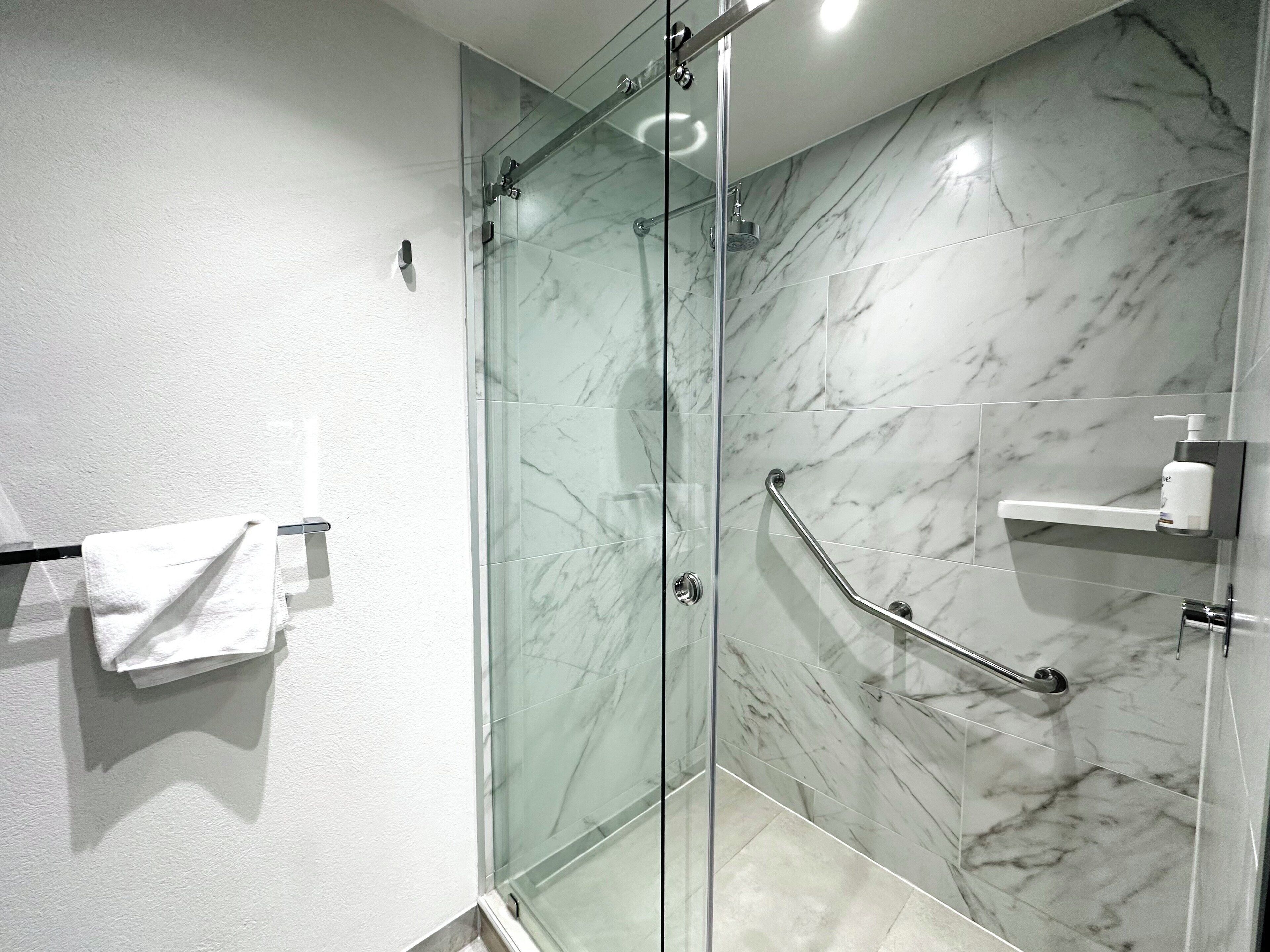 standard room | bathroom | shower, rainfall showerhead, towels