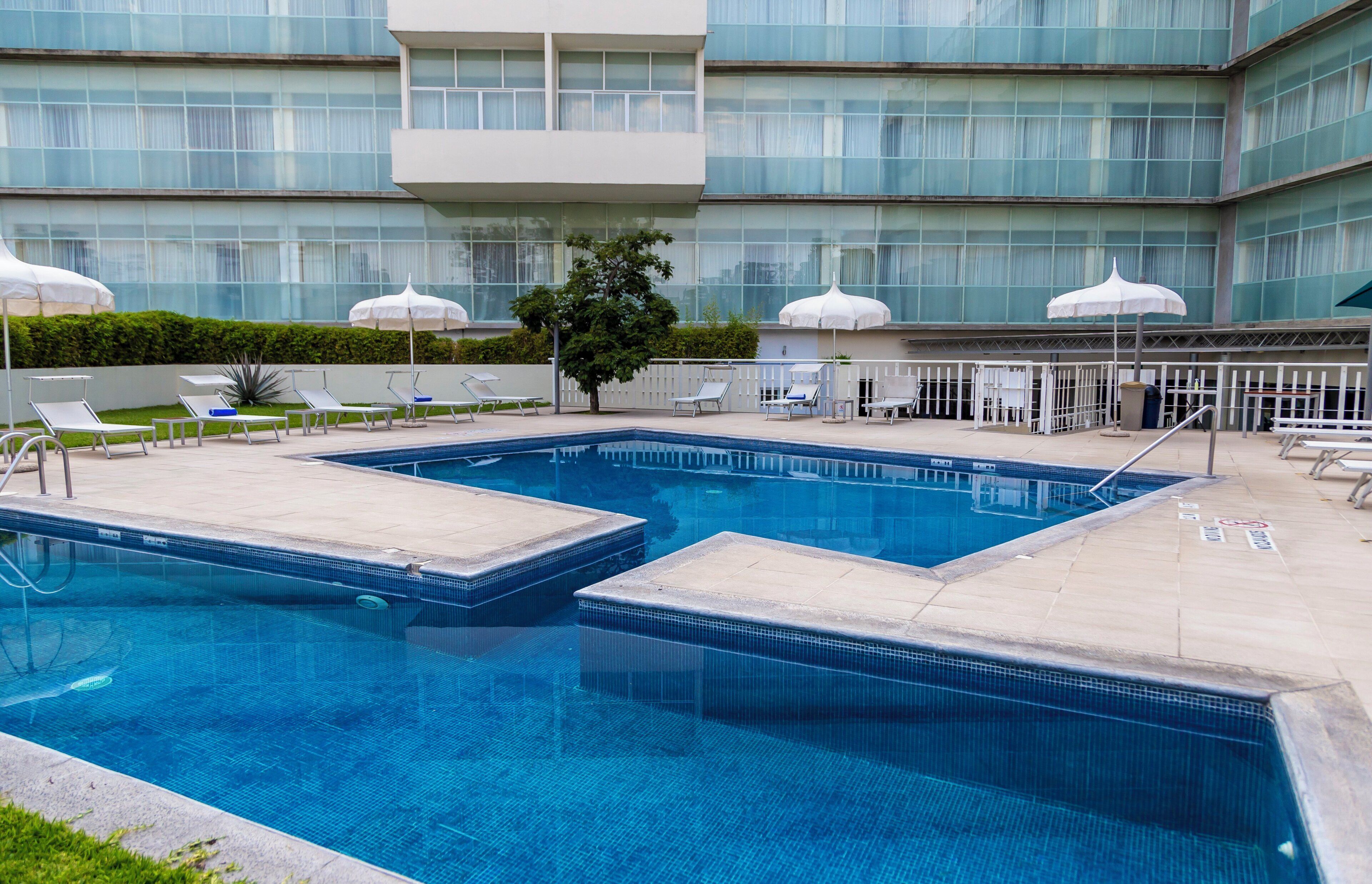 Outdoor pool, open 8 AM to 9 PM, sun loungers