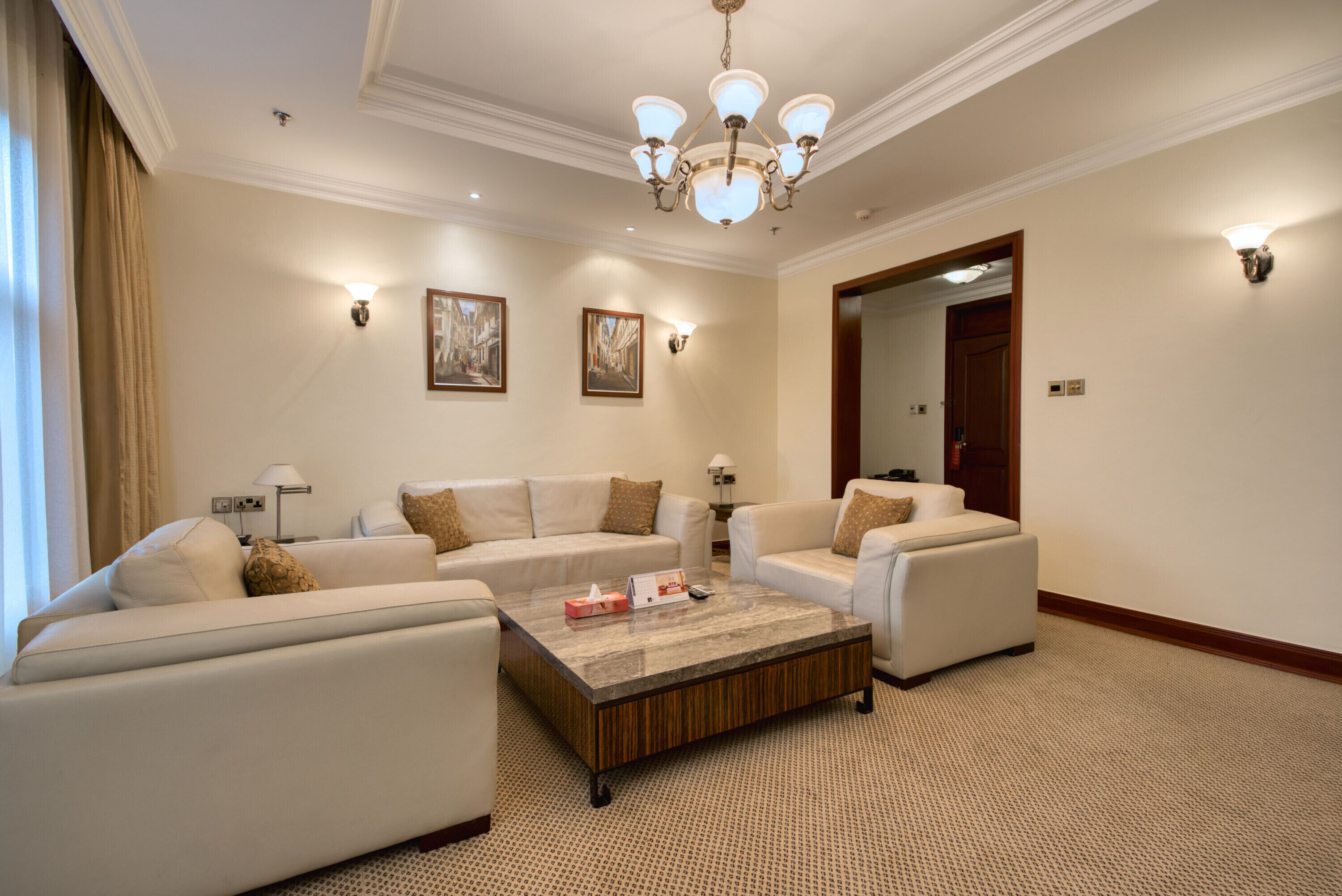 presidential suite, 1 king bed | living area | 32-inch flat-screen tv with satellite channels, tv