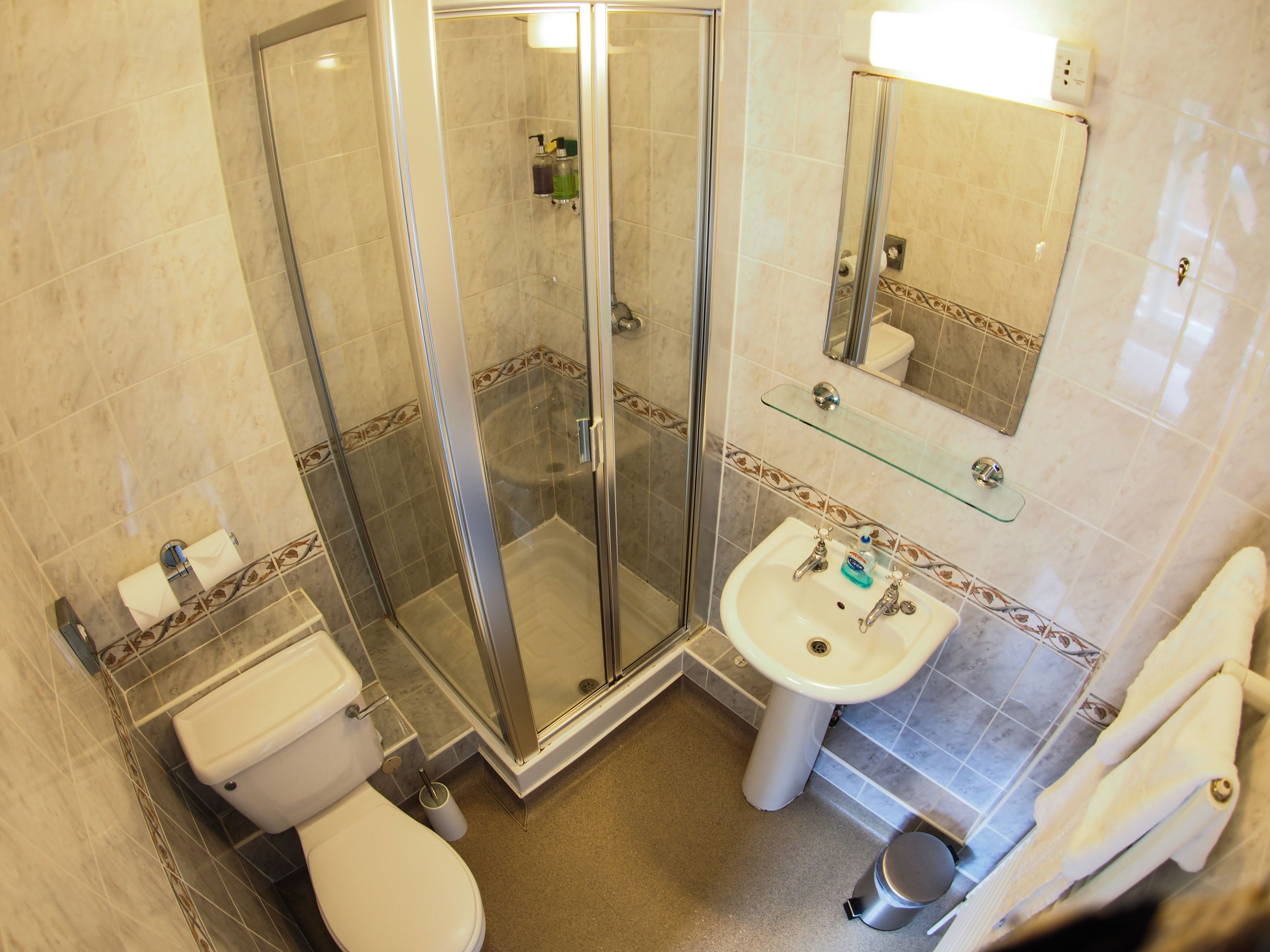 bathroom amenities | shower, free toiletries, hair dryer, towels