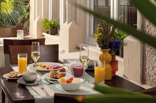Daily buffet breakfast (EUR 14 per person)