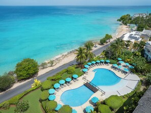Beach nearby, white sand, beach towels