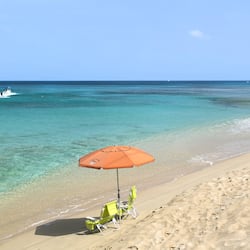 Beach nearby, white sand, beach towels