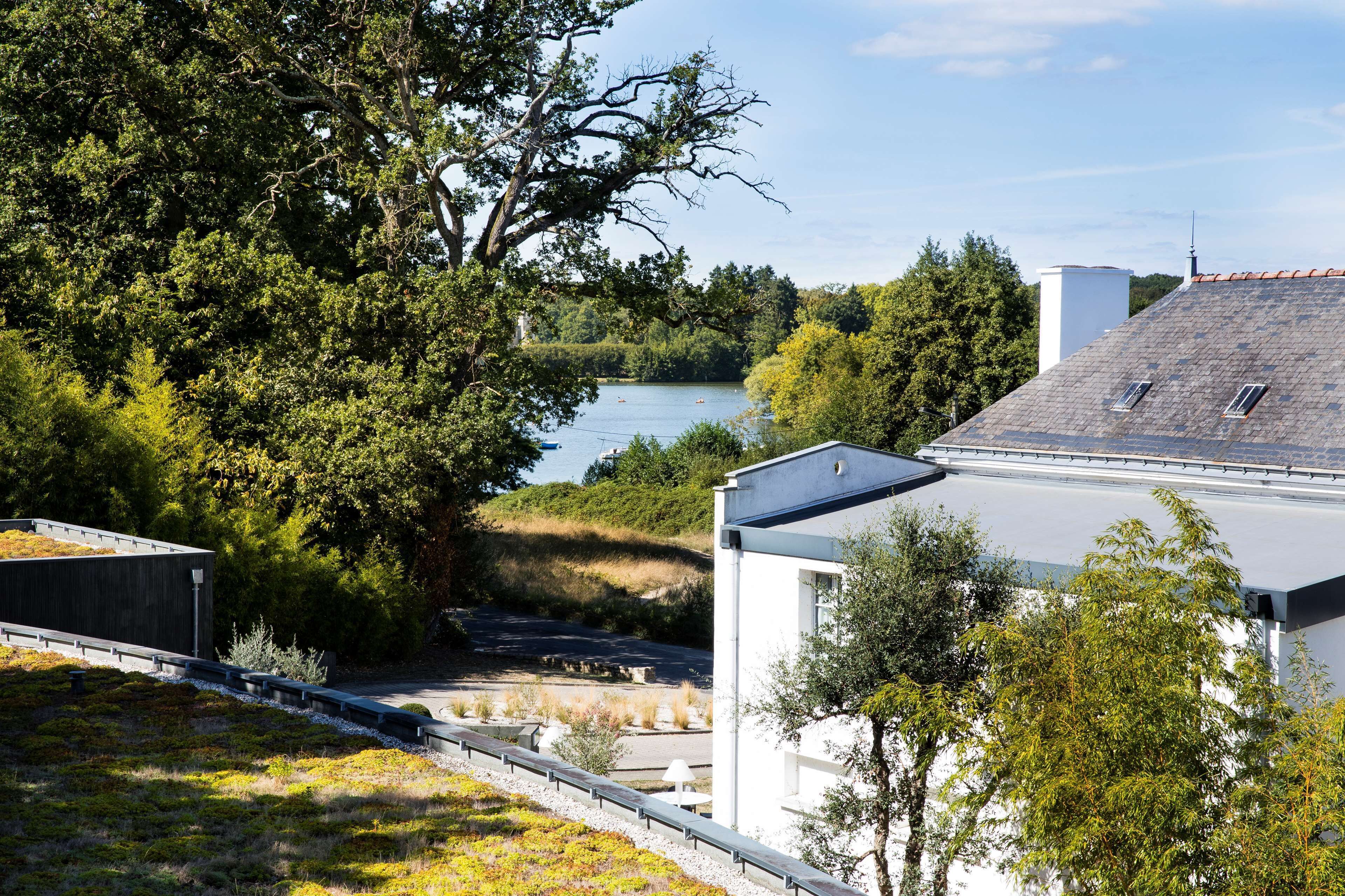 exclusive room, 1 queen bed (twin bed on request) | in-room safe, desk, blackout curtains, soundproofing