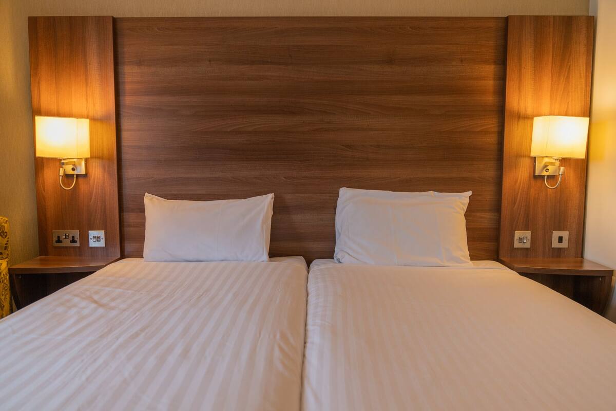 twin room, 2 single beds | desk, iron/ironing board, free cots/infant beds, free wifi