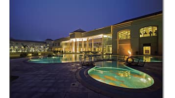 Outdoor pool, open 7:00 AM to 7:00 PM, pool umbrellas, sun loungers
