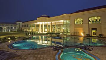 Relax by the pool, surrounded by a classic design and large windows.