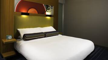Premium bedding, down comforters, pillowtop beds, in-room safe