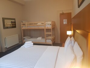 Quadruple Room | Blackout curtains, iron/ironing board, free WiFi, bed sheets