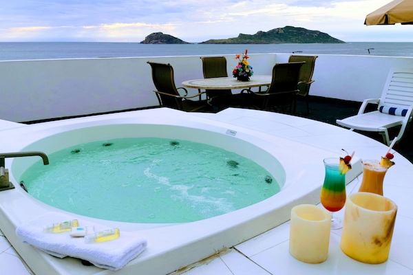 Suite, 1 King bed, Ocean View | In-room safe, individually decorated, individually furnished, desk