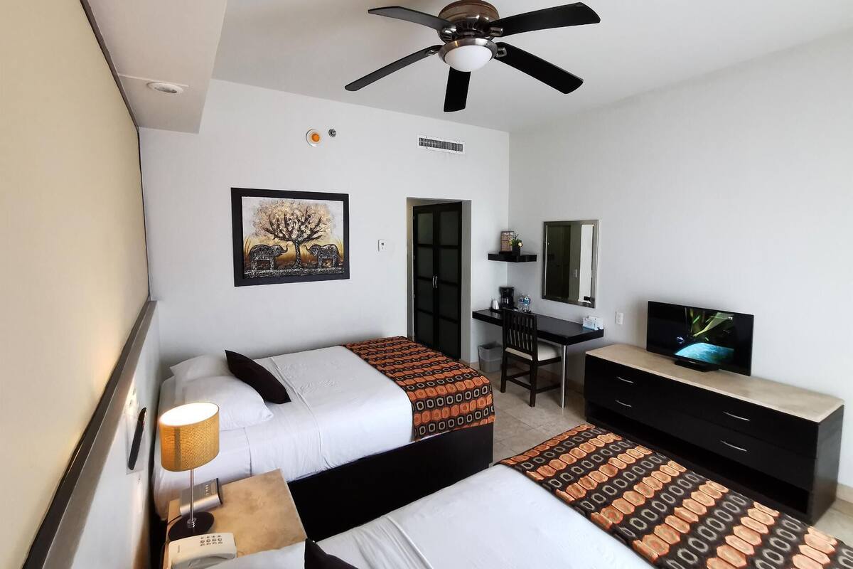 In-room safe, desk, laptop workspace, blackout drapes