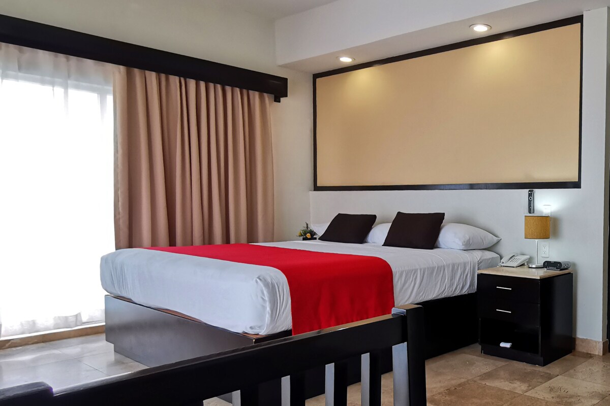 Habitación, 1 cama King size, vista al océano | Caja de seguridad en la habitación y decoración personalizada 