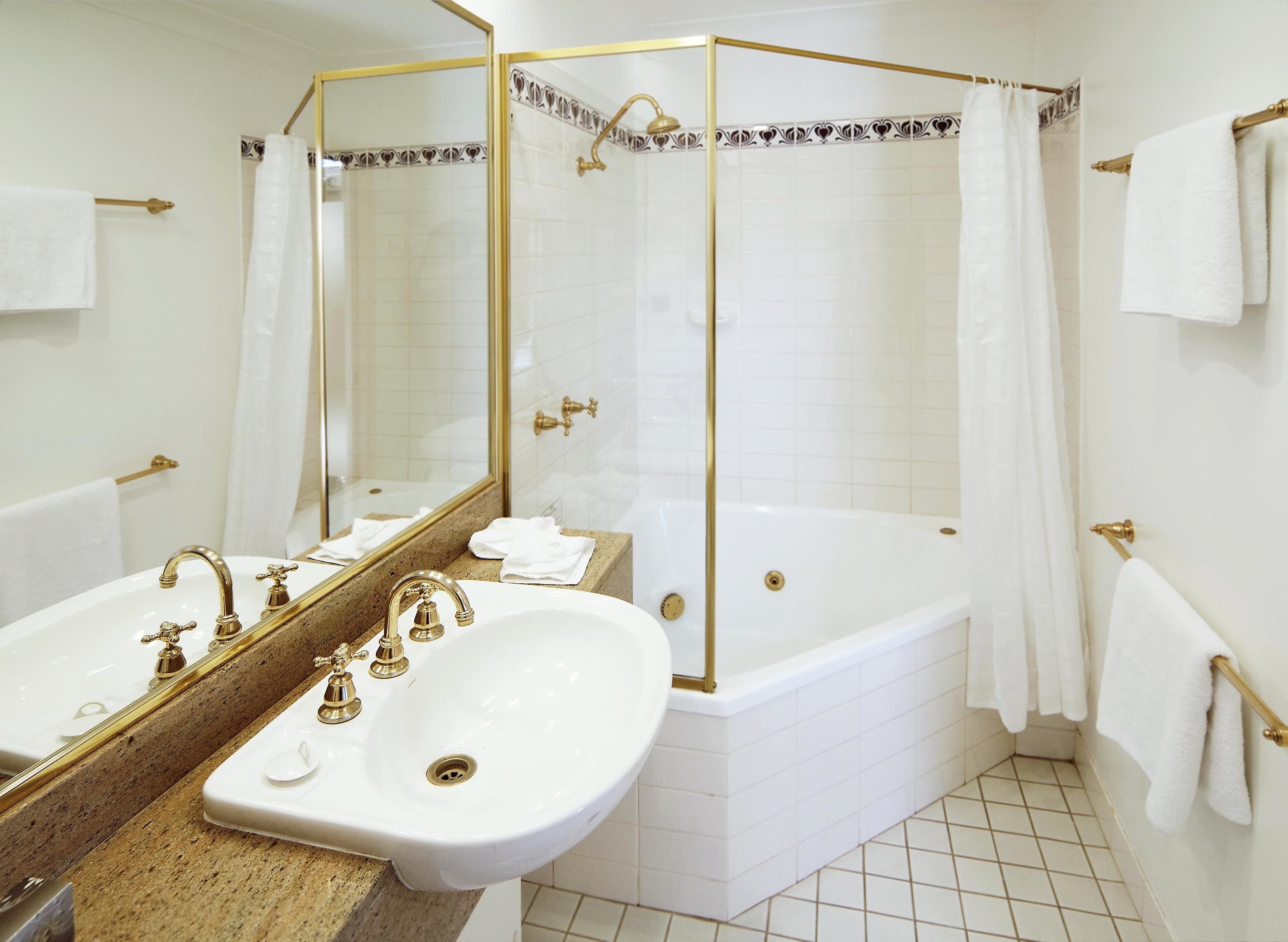 heritage spa and fireplace room | bathroom | hair dryer, towels