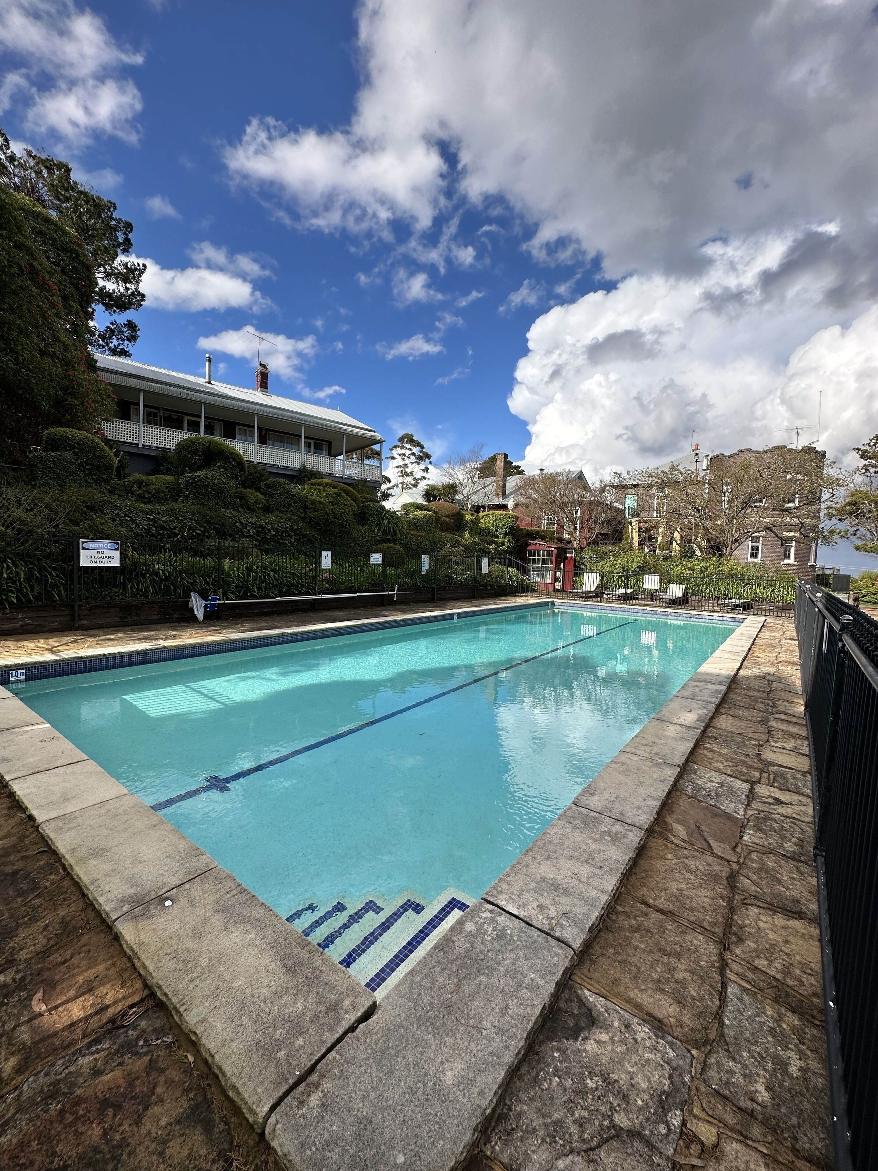 seasonal outdoor pool, open 8:00 am to 8:00 pm, pool loungers