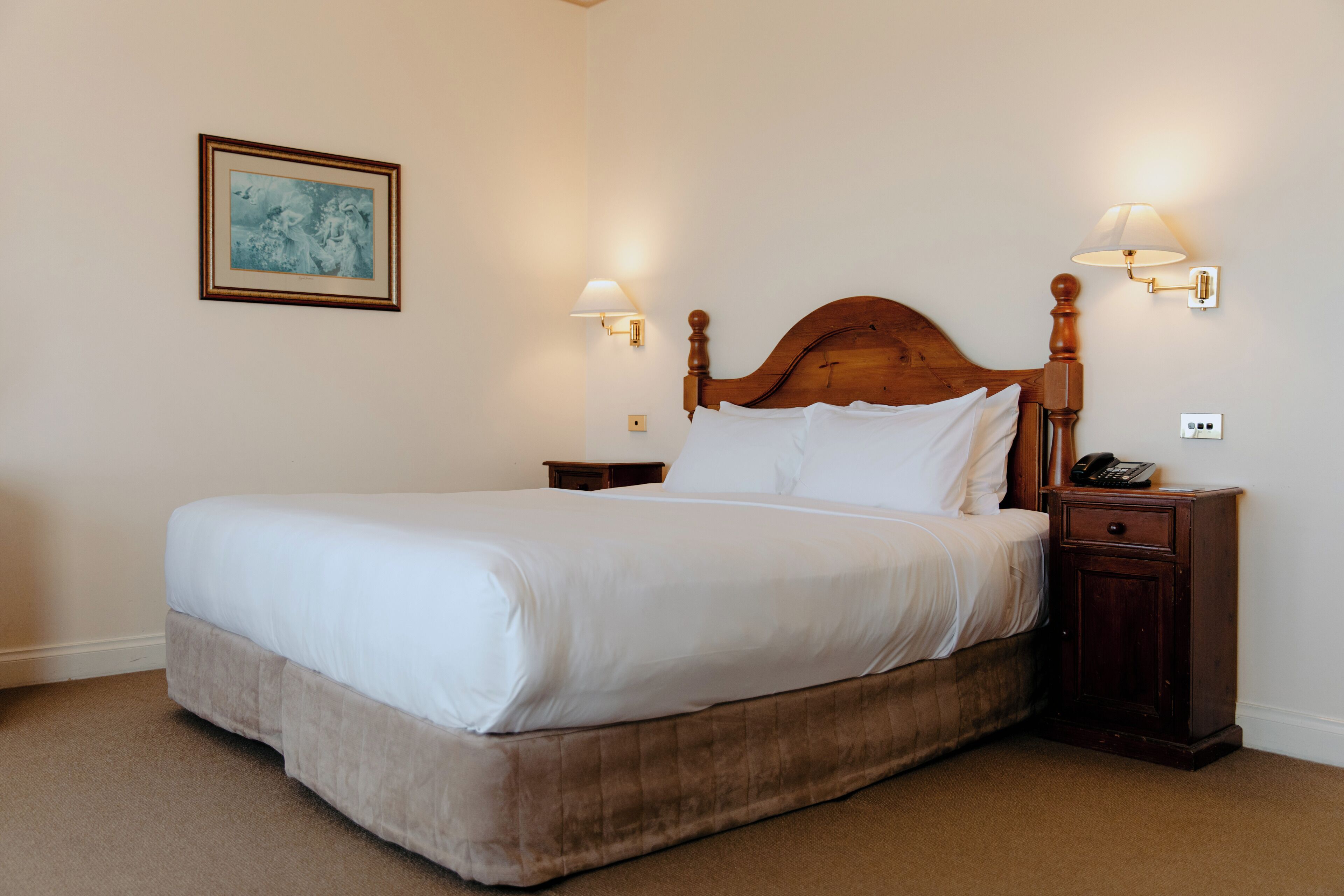 Premium bedding, pillowtop beds, desk, laptop workspace