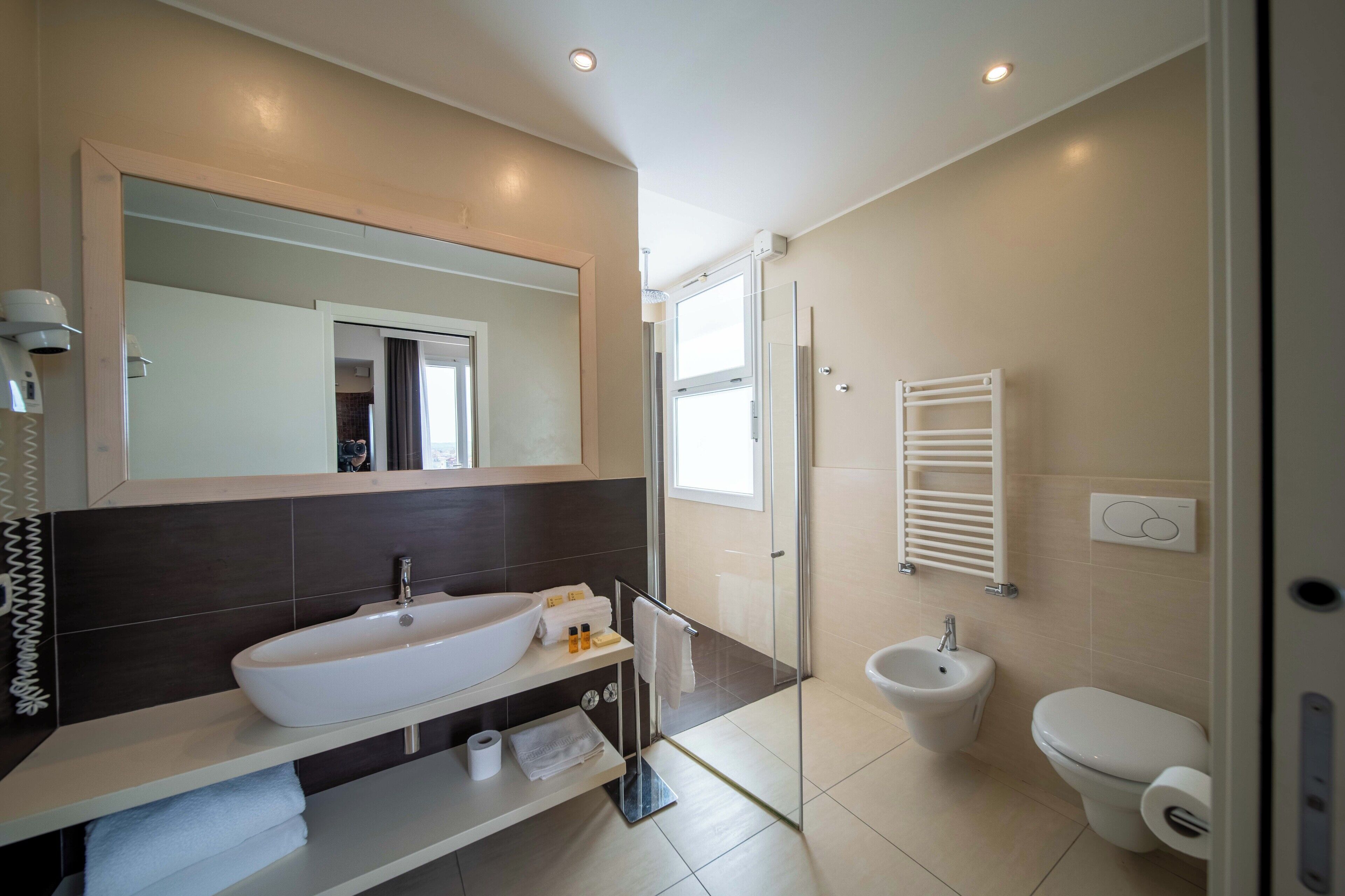 suite | bathroom | shower, rainfall showerhead, free toiletries, hair dryer
