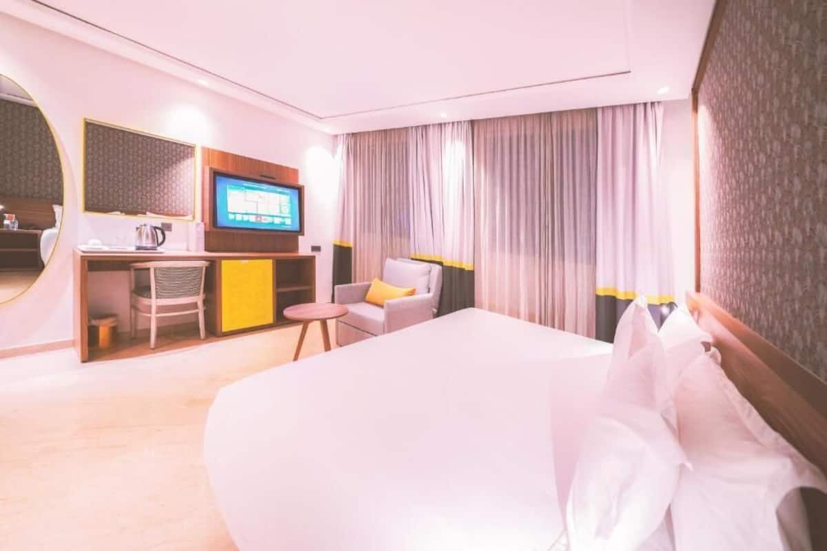 Luxe beddengoed, donzen dekbedden, Select Comfort-bedden, een minibar