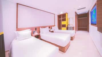 Deluxe Triple Room | Premium bedding, down comforters, Select Comfort beds, minibar