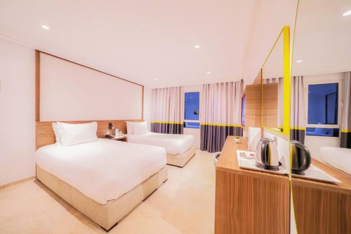 Luxe beddengoed, donsdekens, Select Comfort-bedden, een minibar