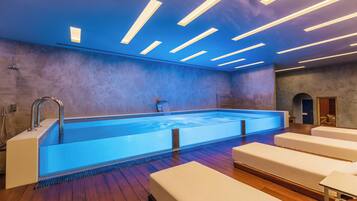 Indoor pool, outdoor pool, pool umbrellas, pool loungers