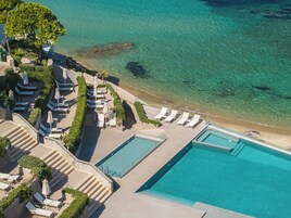 Indoor pool, outdoor pool, pool umbrellas, sun loungers