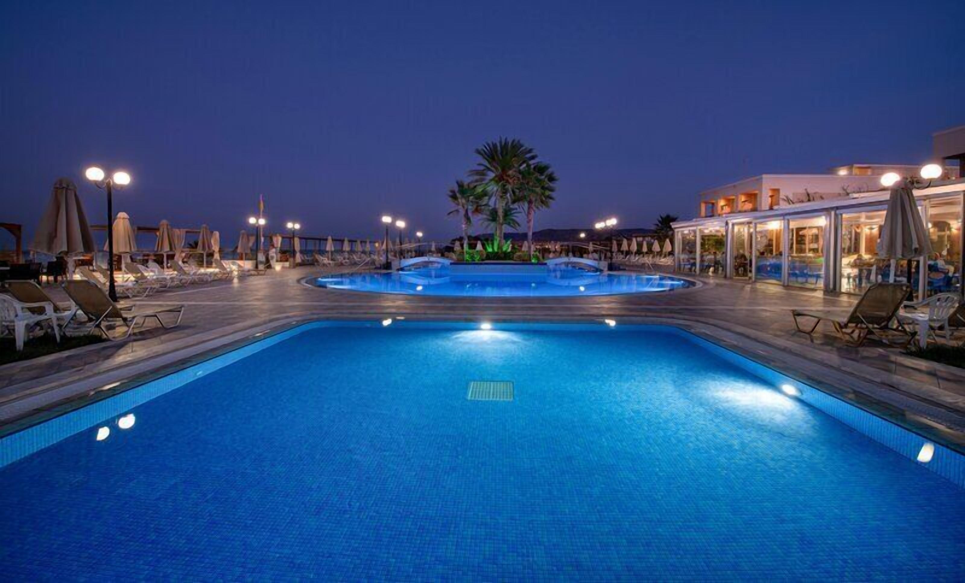 Seasonal outdoor pool, pool umbrellas, pool loungers