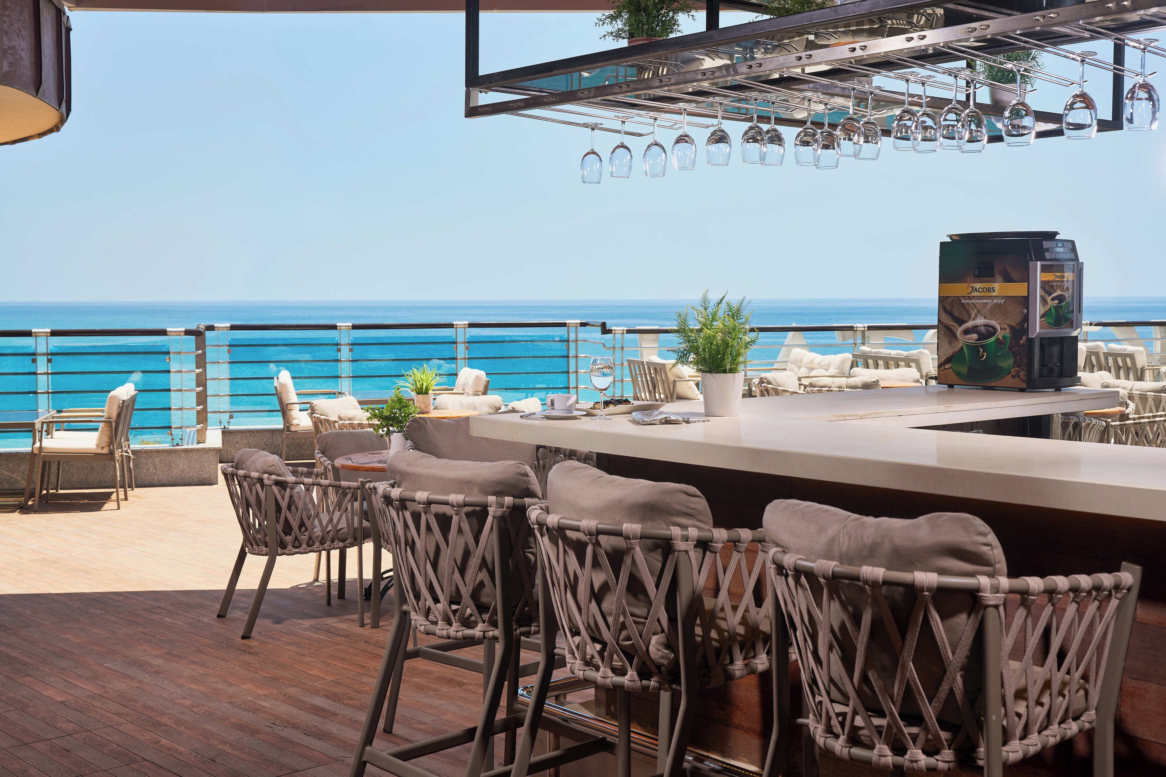 5 bars/lounges, poolside bar, beach bar