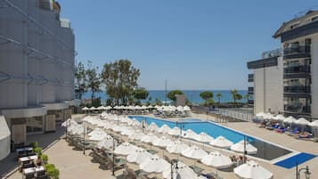 2 outdoor pools, open 8 AM to 7:00 PM, pool umbrellas, pool loungers