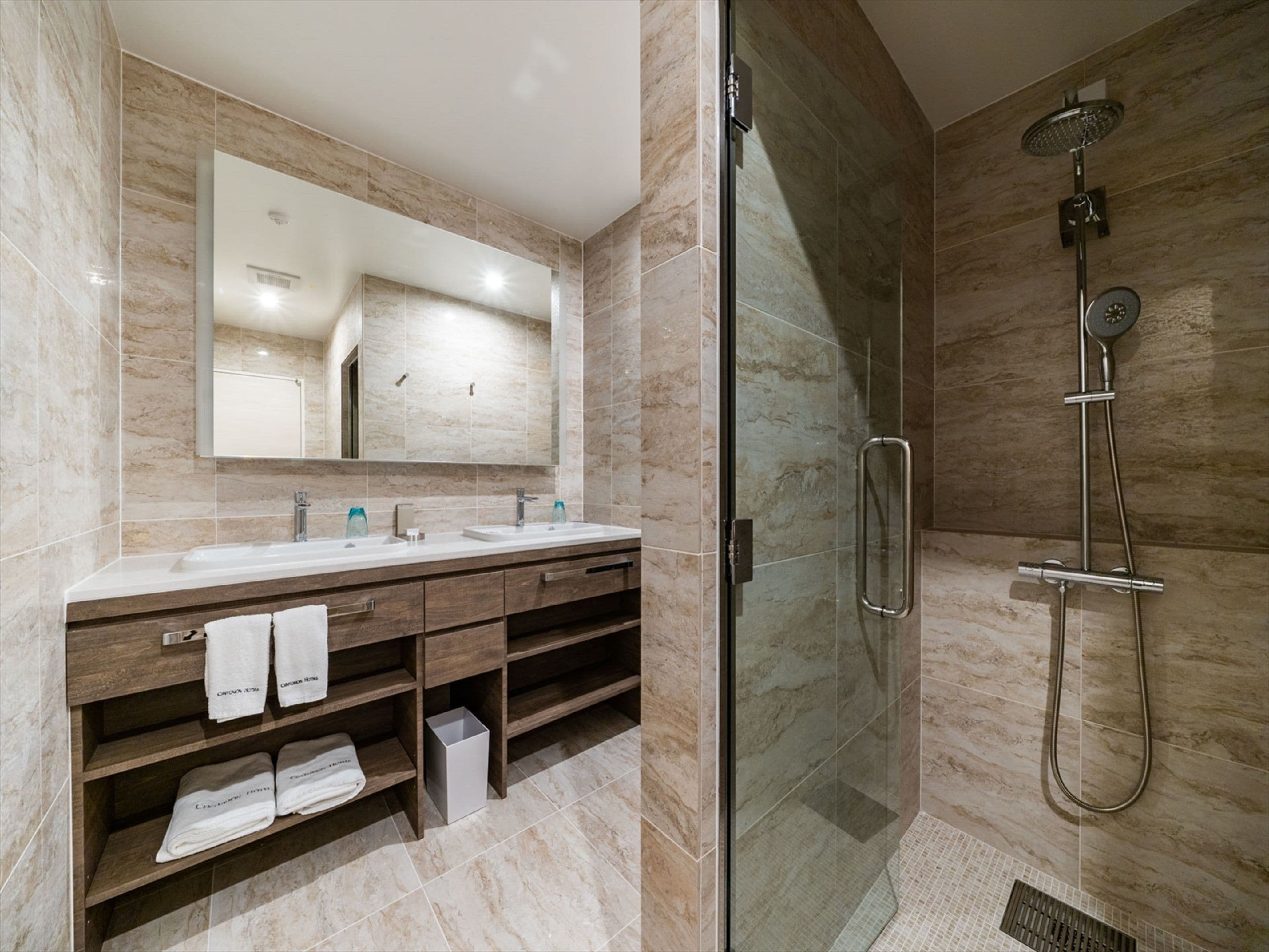 hair dryer, slippers, bidet, towels