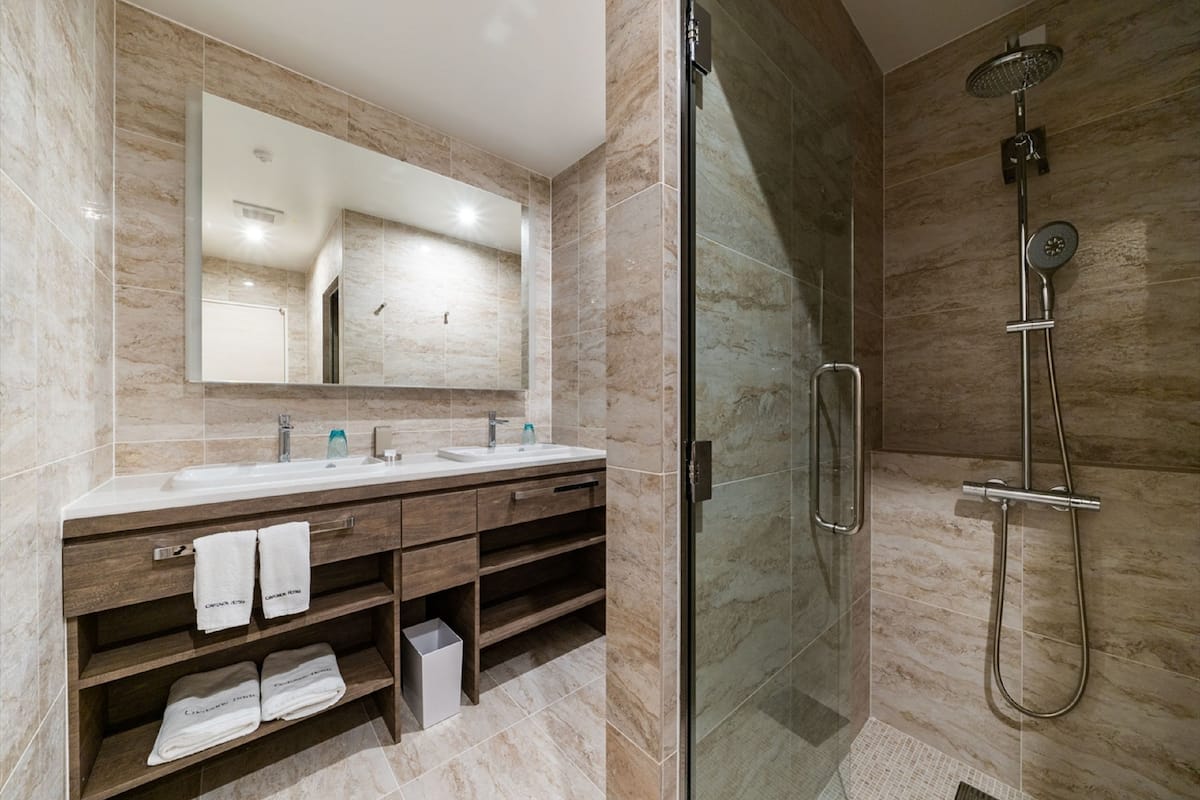 hair dryer, slippers, bidet, towels