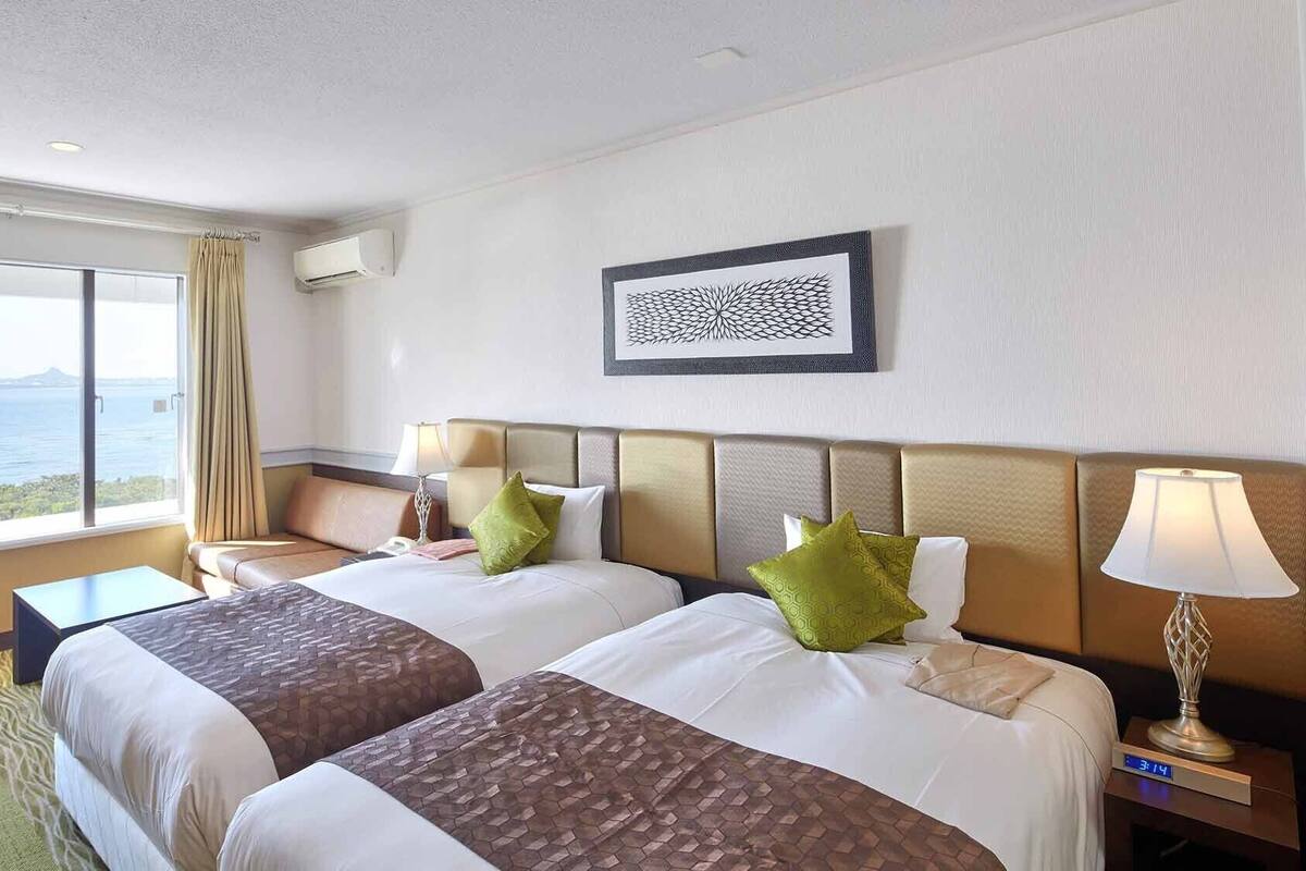 Premium bedding, down duvets, in-room safe, desk