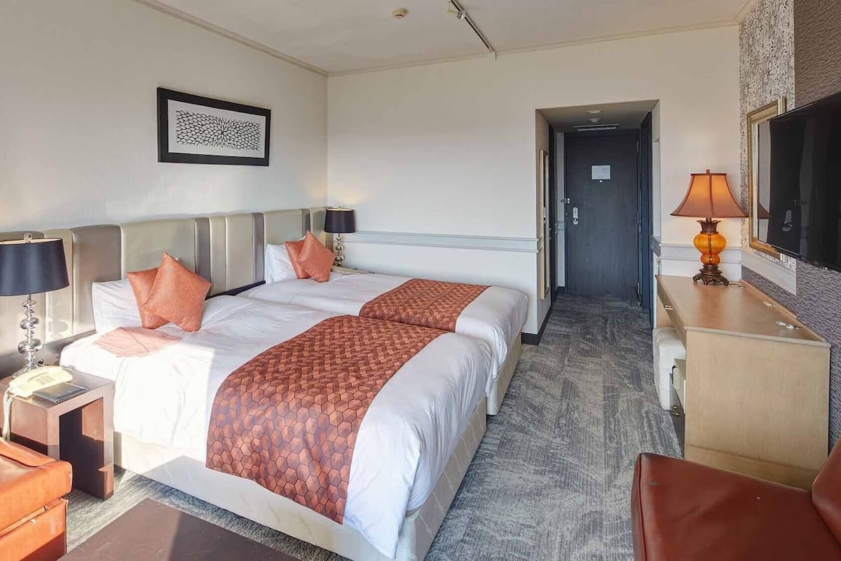 Premium bedding, down duvets, in-room safe, desk