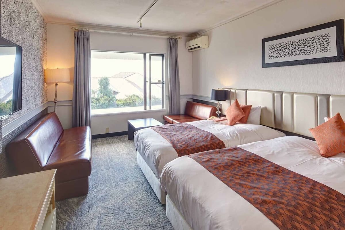 Premium bedding, down duvets, in-room safe, desk