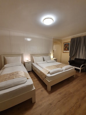 Standard Triple Room | Hypo-allergenic bedding, Select Comfort beds, in-room safe