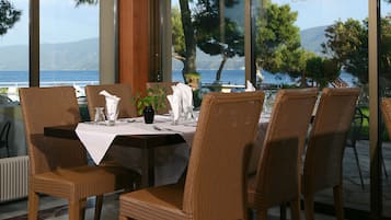 Breakfast, lunch, dinner served; beach views