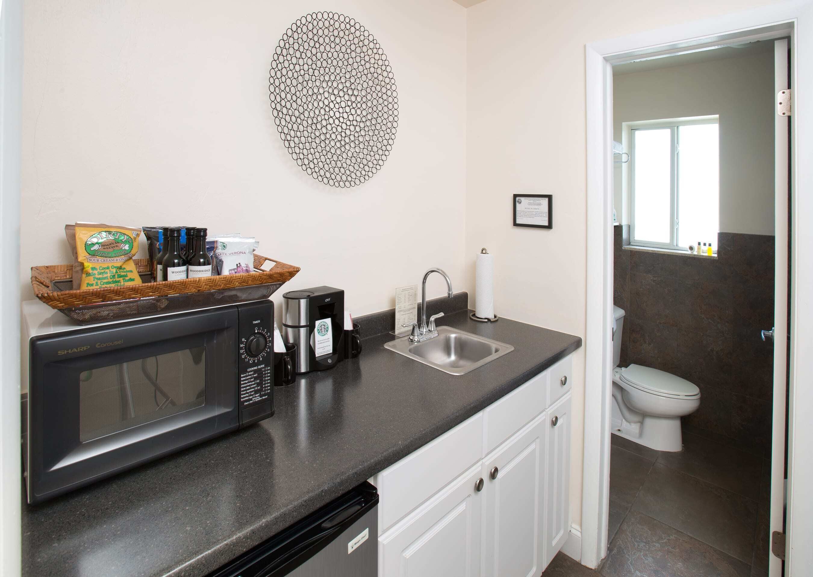 standard single room, men only | in-room safe, desk, soundproofing, iron/ironing board