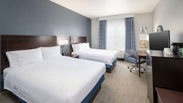 Premium bedding, laptop workspace, blackout drapes, iron/ironing board
