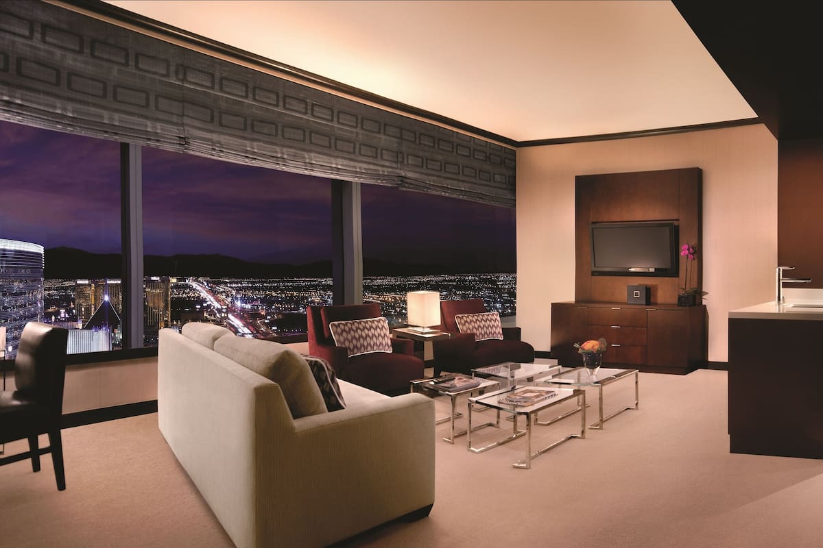 one bedroom penthouse suite | premium bedding, in-room safe, laptop workspace, blackout curtains