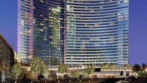 A modern hotel with a curved facade, multiple floors, and a prominent 'Vdara' sign. - Vdara Hotel & Spa at ARIA Las Vegas (Las Vegas)