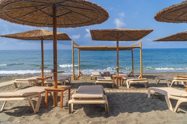 On the beach, sun loungers, beach umbrellas, beach towels
