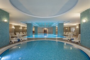 Indoor pool, seasonal outdoor pool, pool umbrellas, sun loungers