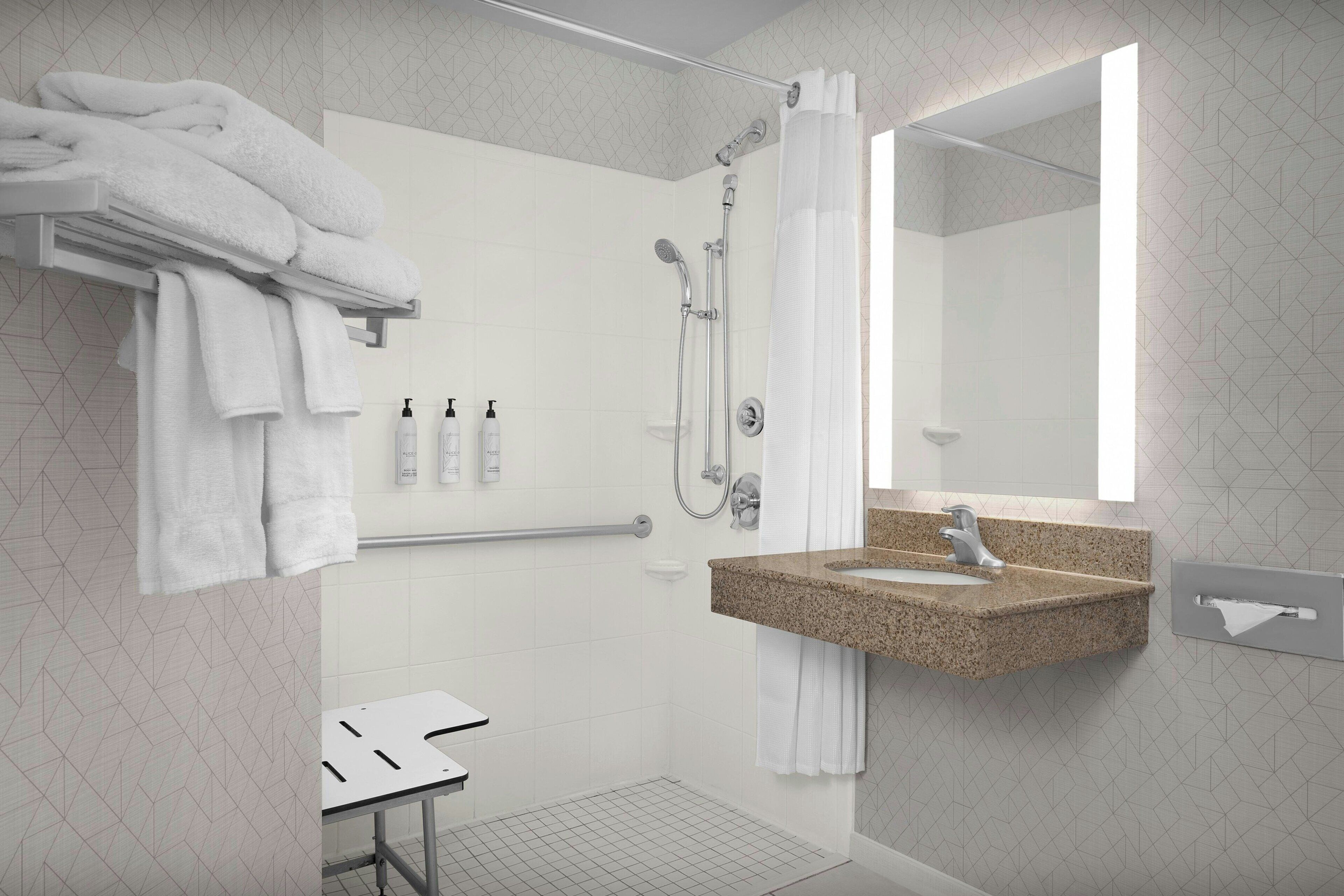 combined shower/bathtub, free toiletries, hair dryer, towels